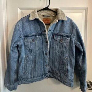 Authentic Levi’s Sherpa Trucker Jacket with metal stars on collar